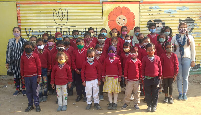 Children smiling at a Vision Unlimited learning center